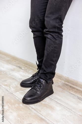 Men's black winter boots with genuine leather. Stylish men's shoes