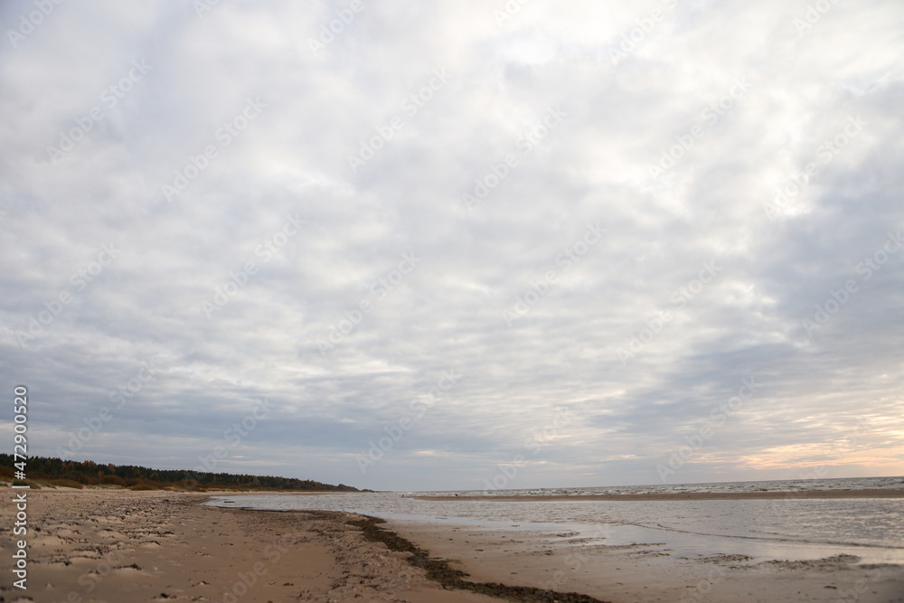 Beautiful seascape shore view with sand and Baltic sea.