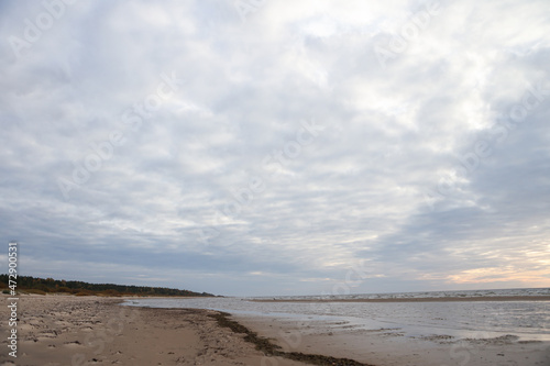 Fototapeta Naklejka Na Ścianę i Meble -  Beautiful seascape shore view with sand and Baltic sea.