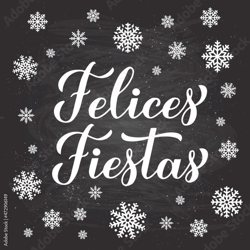 Felices Fiestas calligraphy hand lettering on chalkboard background with snowflakes. Happy Holidays in Spanish. Christmas and Happy New Year typography poster. Vector template for greeting card, etc