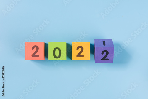 happy new year 2022 colorful cube on blue background