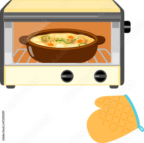 オーブントースターの中で焼かれているグラタン