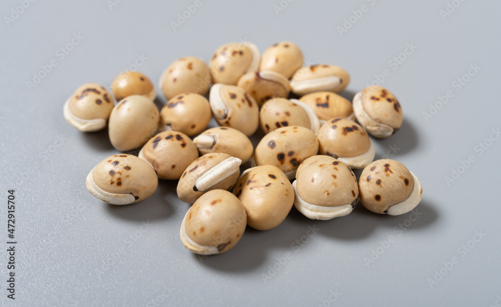 angle view herb ChaoBaiBianDou or Lablab Semen Album or Stir Fried White Hyacinth Bean angle view herb ChaoBaiBianDou or Lablab Semen Album or Stir Fried White Hyacinth Bean