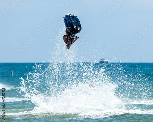 Having fun at the beach with a jet ski. photo