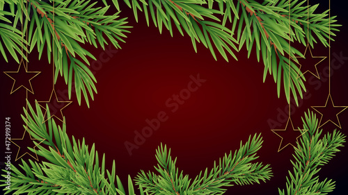 red gradient christmas background with christmas tree branches and balls