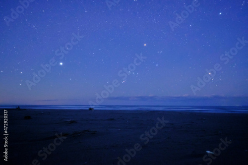 Stars including Orion, Great Dog, Taurus, and the Pleiades sinking in the sea, 3/12/2021  photo