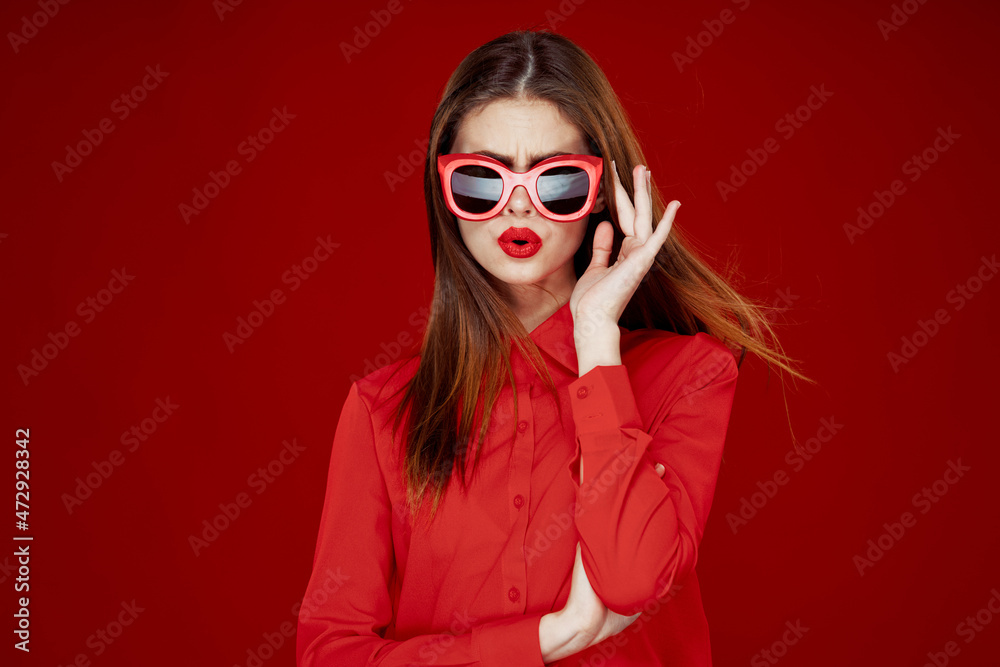 beautiful woman wearing sunglasses red shirt makeup isolated background beautiful woman wearing sunglasses red shirt makeup isolated background