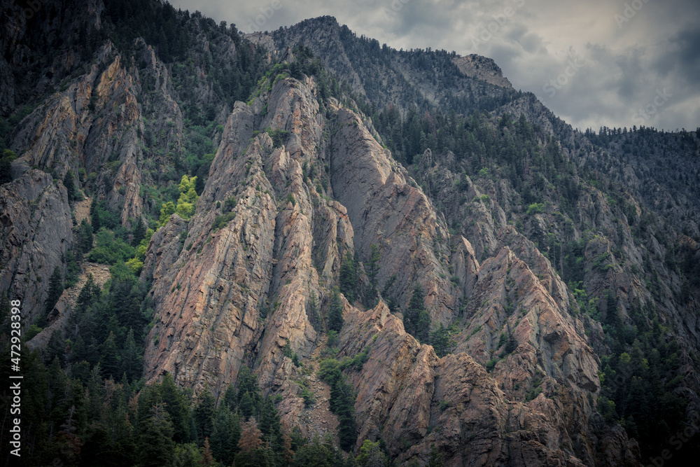 Scenic view of mountain scenery in a cloudy sky in Big Cottonwood Canyon, Salt Lake City, Utah, USA