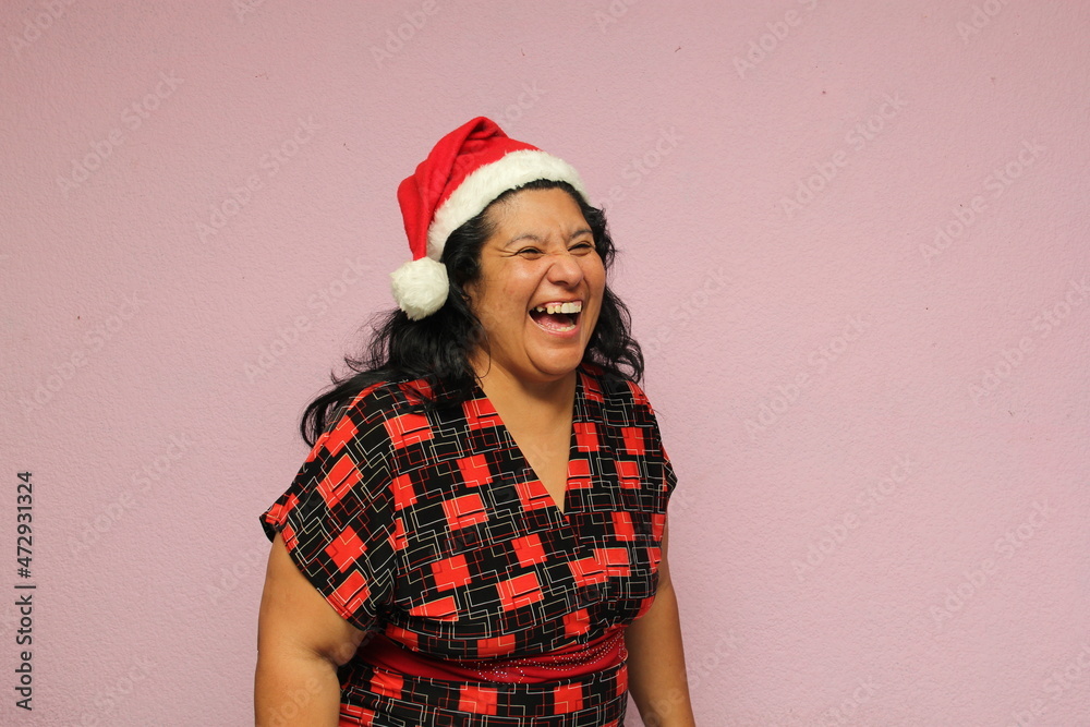 Fat latin adult woman on overweight bodypostive on Santa hat shows her enthusiasm for the arrival of December and celebrating Christmas
Fat latin adult woman on overweight bodypostive on Santa hat shows her enthusiasm for the arrival of December and celebrating Christmas