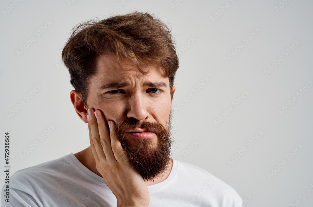 man dental problem dentistry treatment light background