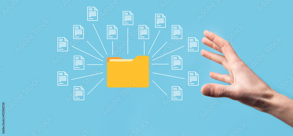 Document Management System DMS .Businessman hold folder and document icon.Software for archiving, searching and managing corporate files and information.Internet Technology Concept.Digital security. Document Management System DMS .Businessman hold folder and document icon.Software for archiving, searching and managing corporate files and information.Internet Technology Concept.Digital security.