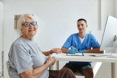 elderly woman patient sitting in the doctor s office visit to the hospital