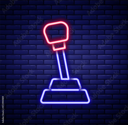 Glowing neon line Gear shifter icon isolated on brick wall background. Manual transmission icon. Colorful outline concept. Vector