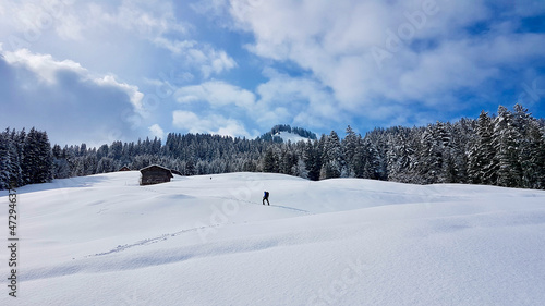 Ski mountaineer in idyllic untouched winter landscape. Austrian Alps, Vorarlberg. © Maleo Photography