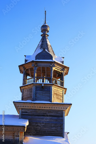 wooden church in the Russian north landscape in winter, architecture historical religion Christianity photo