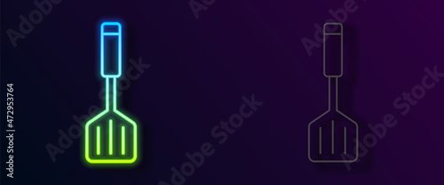 Glowing neon line Spatula icon isolated on black background. Kitchen spatula icon. BBQ spatula sign. Barbecue and grill tool. Vector