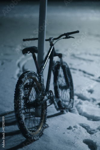 Bicycle in the winter on the street.