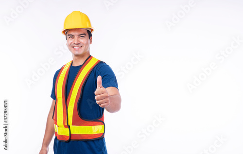 Maintenance workman occupation concept. Handsome confident smile craftsman wear yellow helmet hard hat safety showing thumbs up for good job while standing over isolated white background.