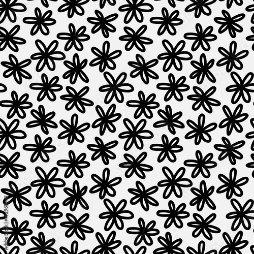 Abstract hand drawn seamless pattern with flower shape elements. Black and white texture.