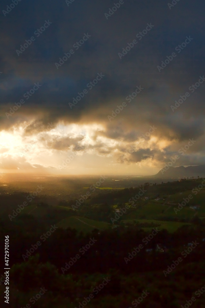 Fototapeta premium Moody morning clouds with sunlight coming through