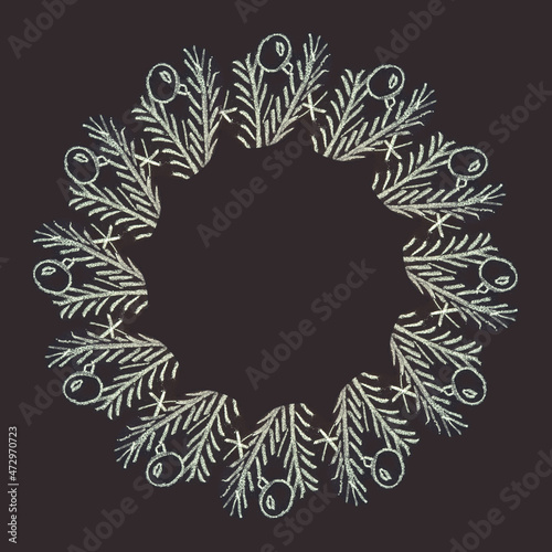 Round frame of fir branches for Christmas, drawn with chalk on a blackboard.