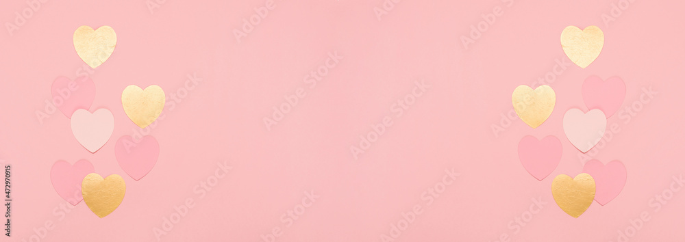 Pink, golden paper hearts on pastel pink background. Valentines day concept. Flat lay.