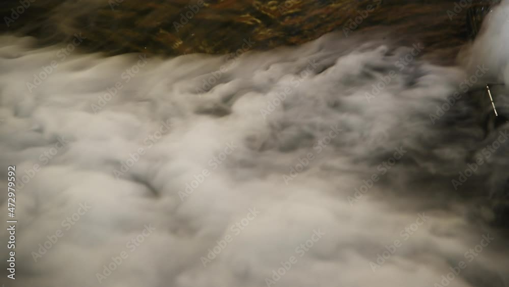 Water and smoke and the reflections on the water consist of beautiful colors. Water and smoke and the reflections on the water consist of beautiful colors.