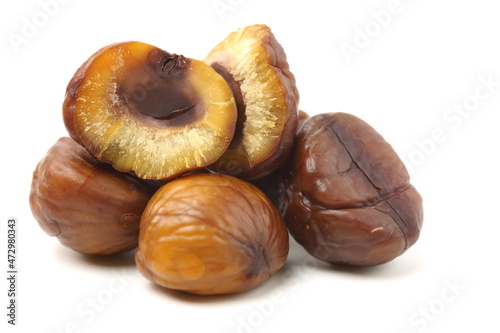 chinese food, peeled roasted chestnut on white background