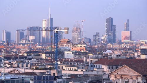 Europe , Italy , Milan December 2021 -  aerial view of the city skyline in Gae Aulenti Garibaldi  at sunset from Duomo Terrace  © andrea