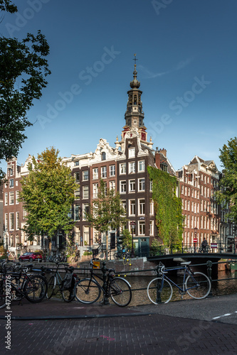 Street view with buildings and during day and canal in Amsterdam, Netherlands