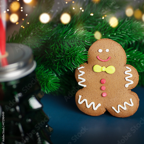 Blurred Christmas decoration with gingerbread man on Blue background