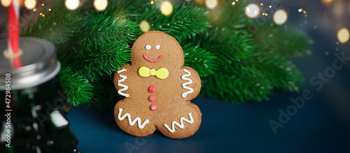 Blurred Christmas decoration with gingerbread man on Blue background