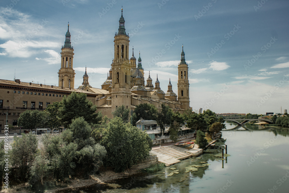 Old historical buildings during summer day in Zaragoza, Spain