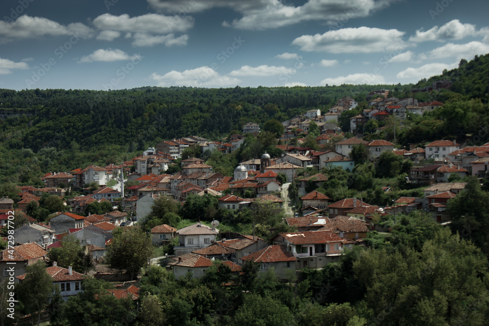 City in mountain area with greenery in summer day in Veliko Tarnovo, Bulgaria