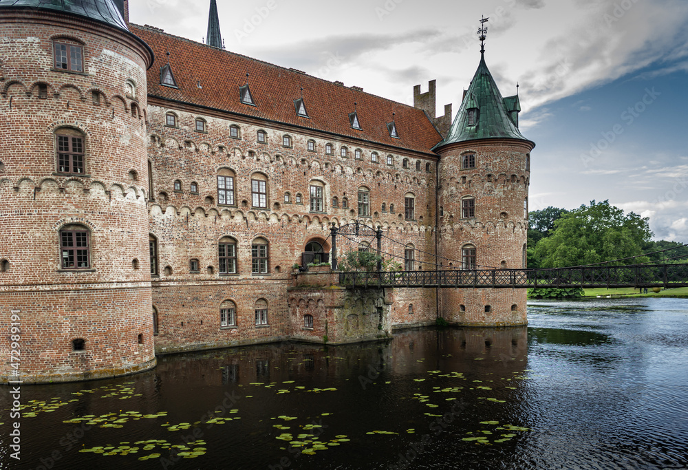 Castle estate during summer day in Egeskov Slot, Denmark