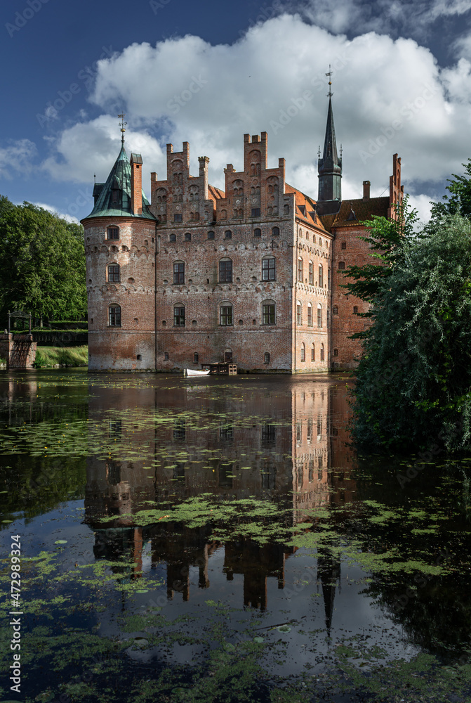 Castle estate during summer day in Egeskov Slot, Denmark