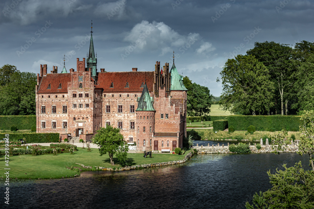 Castle estate during summer day in Egeskov Slot, Denmark