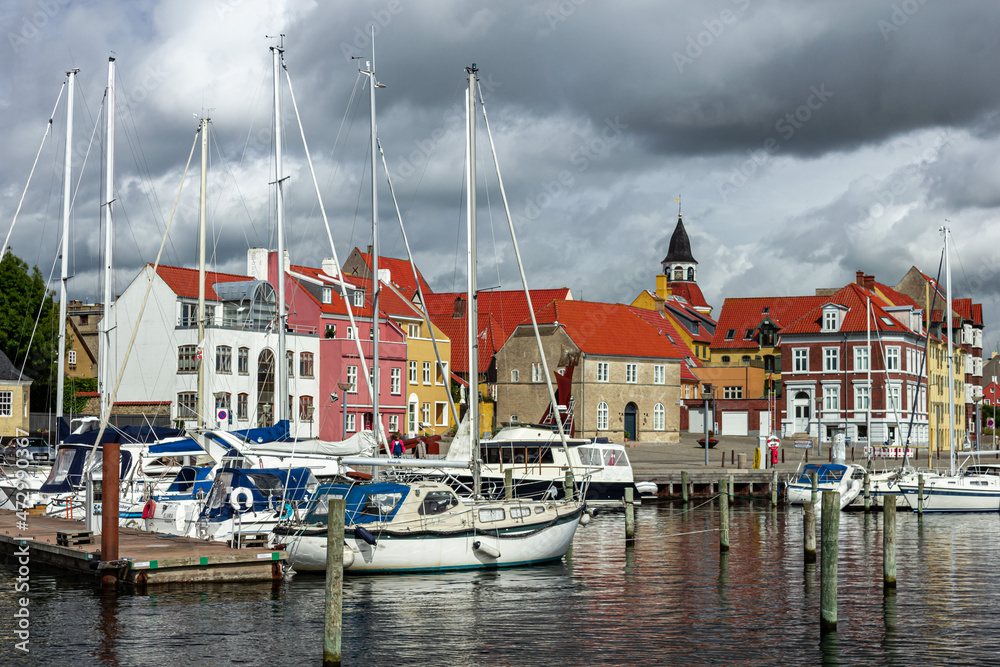 Fototapeta premium Beautiful view of old port town with charming buildings in Svendborg, Denmark