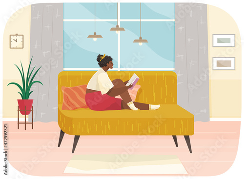 Girl sits at home and reads. Woman with book in her hands spending time in apartment. Female character is reading and resting after work. Sits on couch and studies book. Leisure, pastime at home
