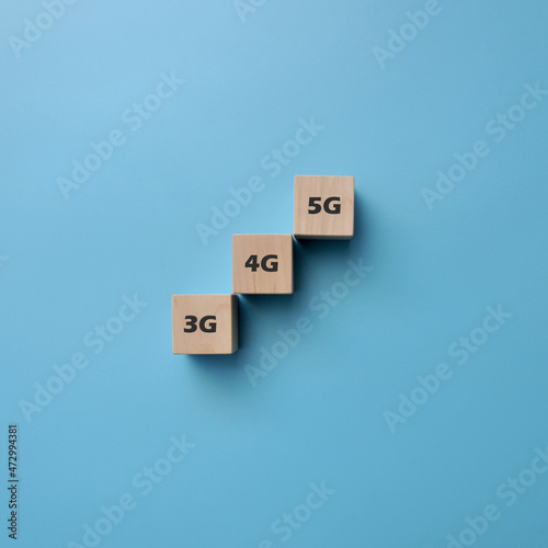 Wooden cubes with the inscription: 3G, 4G, 5G. A symbol of replacing the old Internet with a new high-speed Internet