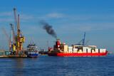 Maritime Scene of container ship docking at port facilities. 