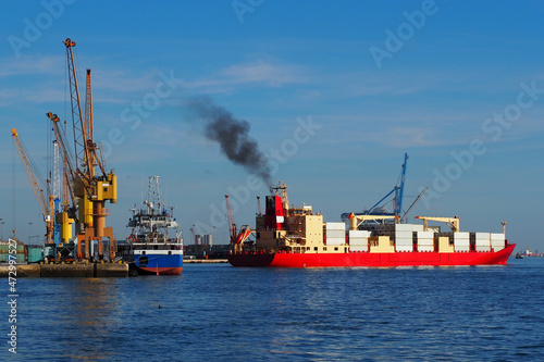 Maritime Scene of container ship docking at port facilities. 