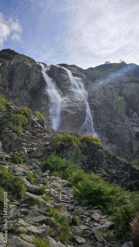 WATERFALL IN THE MOUNTAINS