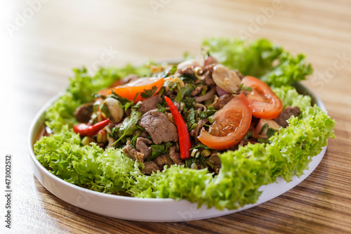 Thai spicy beef salad yum nua photo