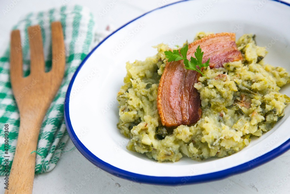 Trinxat de la Cerdaña. Typical recipe from the north of Catalonia cooked with white cabbage, potato and bacon. Trinxat de la Cerdaña. Typical recipe from the north of Catalonia cooked with white cabbage, potato and bacon.