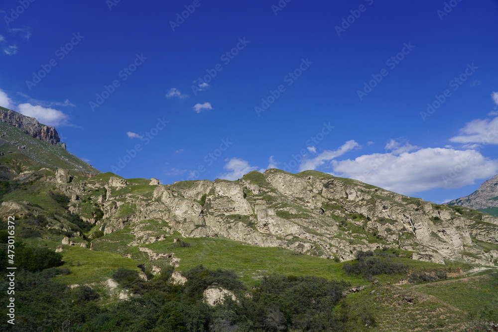 Landscape with sky and clouds. Rocks and hills Landscape with sky and clouds. Rocks and hills