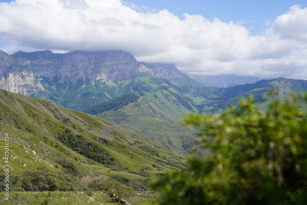 Naklejka premium Landscape with sky and clouds. Rocks and hills