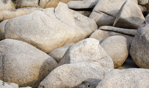 Large blocks of gray granite in close-up.