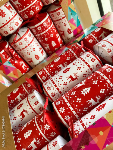 Red and white Christmas crackers.  © Nadya