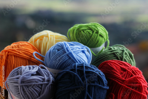 Still life of multi-colored threads for knitting or crocheting 